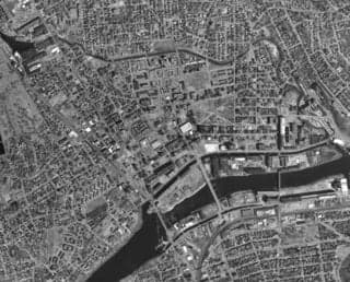 A black and white aerial photo of Lawrence, MA.