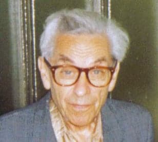 Photo of Paul Erdős wearing glasses.