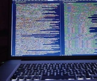 Photo of HTML text on a computer monitor.